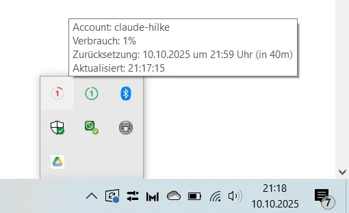 Windows-Infobereich mit Tooltip für das Konto claude-hilke, ein Prozent Verbrauch und Zeitpunkt der Zurücksetzung